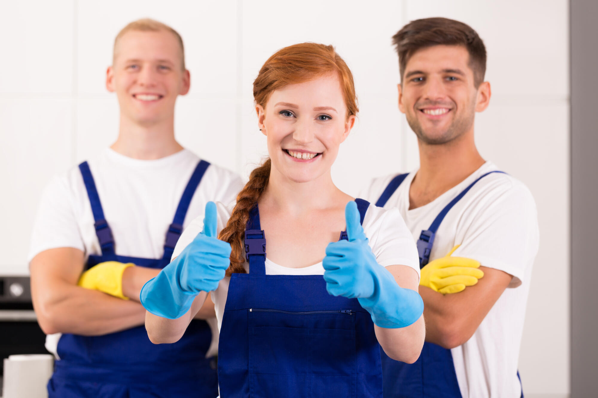 Cleaning lady and two men wear